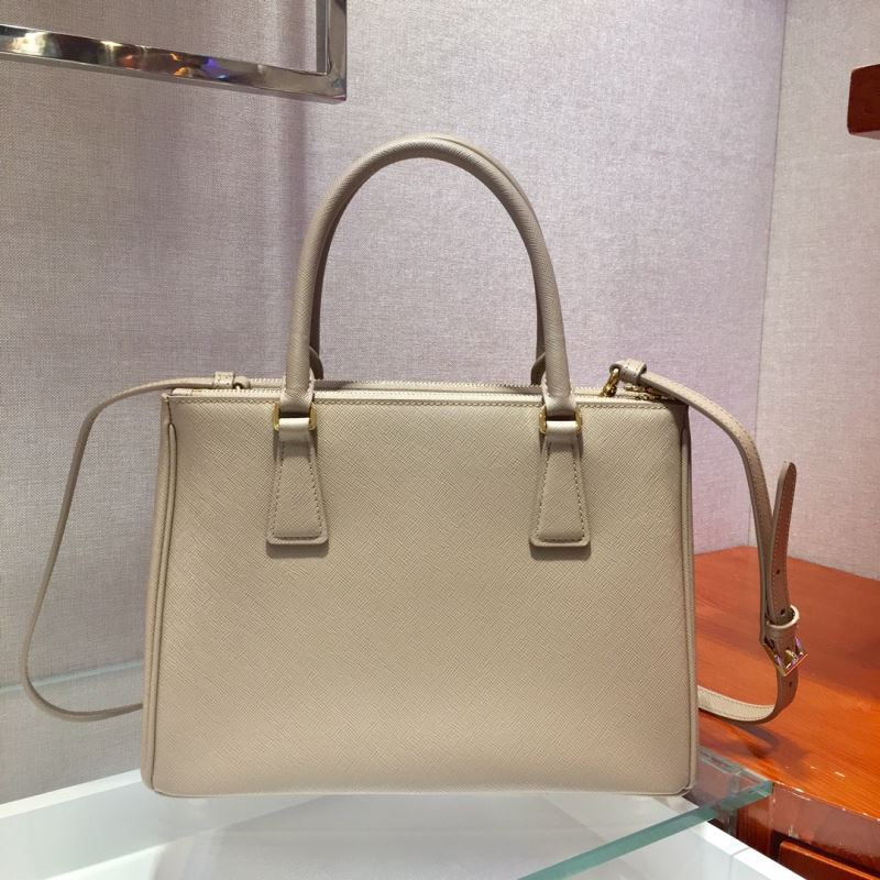Pra*a top handle bags
